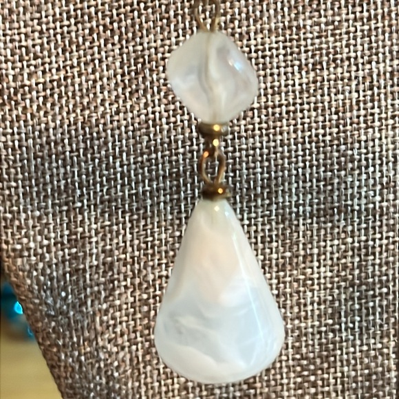 Gold tone drop earrings with clear/white swirl beads - Picture 2 of 5